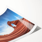 Stunning landscape print showcasing vibrant canyons in warm earth tones, rolled up for easy transport and display, ideal for home decor enthusiasts.