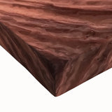 Close-up of a stretched canvas artwork depicting a vibrant canyon landscape with rich earth tones and intricate details, ideal for home decor enthusiasts.