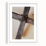 Abstract art print of spring themes in soft green and pink hues, framed in white, ideal for dining room decor.