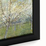 Close-up of a textured, colorful art piece on black canvas, depicting an abstract design.