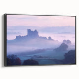 Framed canvas artwork depicting a scenic landscape with a castle, featuring a sleek black frame and vibrant colors, ideal for home decor in living spaces or offices.
