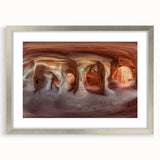 Framed silver landscape artwork depicting a serene cave scene, enhanced by a white mat, perfect for modern home decor and art enthusiasts.