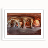 Framed landscape artwork featuring a serene cave scene, adorned with a white mat for an elegant presentation, ideal for home or office decor. The image highlights the intricate details of the natural formations and vibrant colors, creating a calming atmosphere.