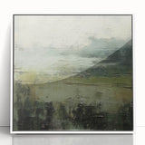 Framed abstract landscape wall art featuring soft, muted colors of blue and beige, showcasing a serene natural scene with a modern acrylic finish.