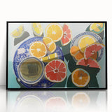 Large abstract wall art featuring assorted fruits in bold colors on black acrylic, framed, ideal for modern kitchen decor.