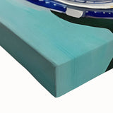 Large art of a black and white landscape painting on stretched canvas, depicting a fruit arrangement.