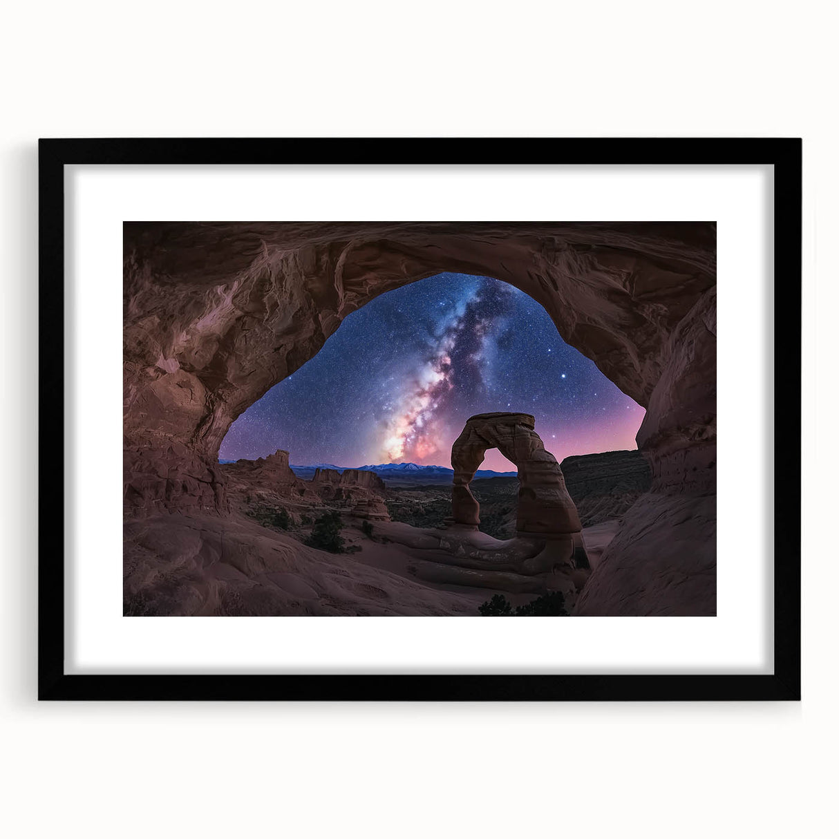 Landscape canyon artwork framed with a black mat, showcasing vibrant colors and intricate details, perfect for adding a touch of nature to any decor.