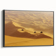 Framed canvas artwork depicting a serene desert landscape, featuring warm earth tones and intricate details, presented in a sleek black frame, ideal for modern home decor.