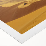 Vibrant rolled canvas showcasing a stunning desert landscape with warm hues of orange and gold, meticulously packaged in a durable cardboard tube for easy transport. This artwork captures the serene beauty of arid terrain, making it a perfect addition to home decor.