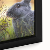 Close-up of extra large framed canvas depicting spring scene in textured style with vibrant colors on a black background.