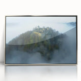 Framed acrylic artwork showcasing a majestic castle landscape in silver hues, elegantly displayed against a minimalist backdrop, perfect for home decor enhancement.