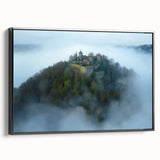 Framed canvas artwork depicting an enchanting landscape with a castle, featuring a black frame and side view, ideal for home decor and wall art enthusiasts.
