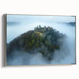 Framed canvas artwork showcasing a picturesque landscape with an enchanting castle, set against a serene backdrop. The silver frame adds elegance, enhancing home decor.
