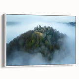 Framed canvas artwork depicting a majestic landscape with a castle, featuring a white frame and side view, perfect for enhancing home decor with elegance.