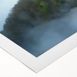 Rolled canvas showcasing a vibrant landscape with a majestic castle, featuring rich colors and intricate details, packaged securely in a protective cardboard tube.