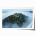Stunning rolled print of a picturesque landscape featuring a majestic castle surrounded by lush greenery and a serene blue sky, perfect for home decor or art enthusiasts.