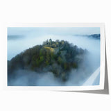 Stunning rolled print of a picturesque landscape featuring a majestic castle surrounded by lush greenery and a serene blue sky, perfect for home decor or art enthusiasts.