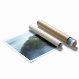 Rolled print showcasing a detailed landscape of a majestic castle surrounded by lush greenery, perfect for home decor. Packaged securely in a protective tube for delivery.