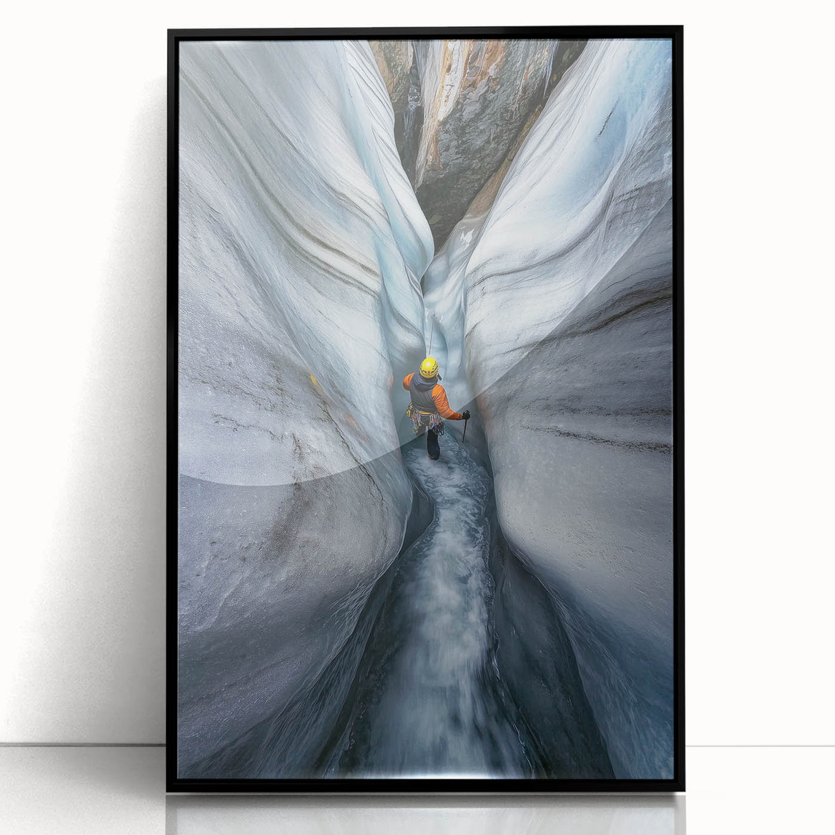 Framed acrylic wall art showcasing a vibrant landscape design of caves, featuring deep colors and intricate details, set against a sleek black frame. Ideal for modern home decor.