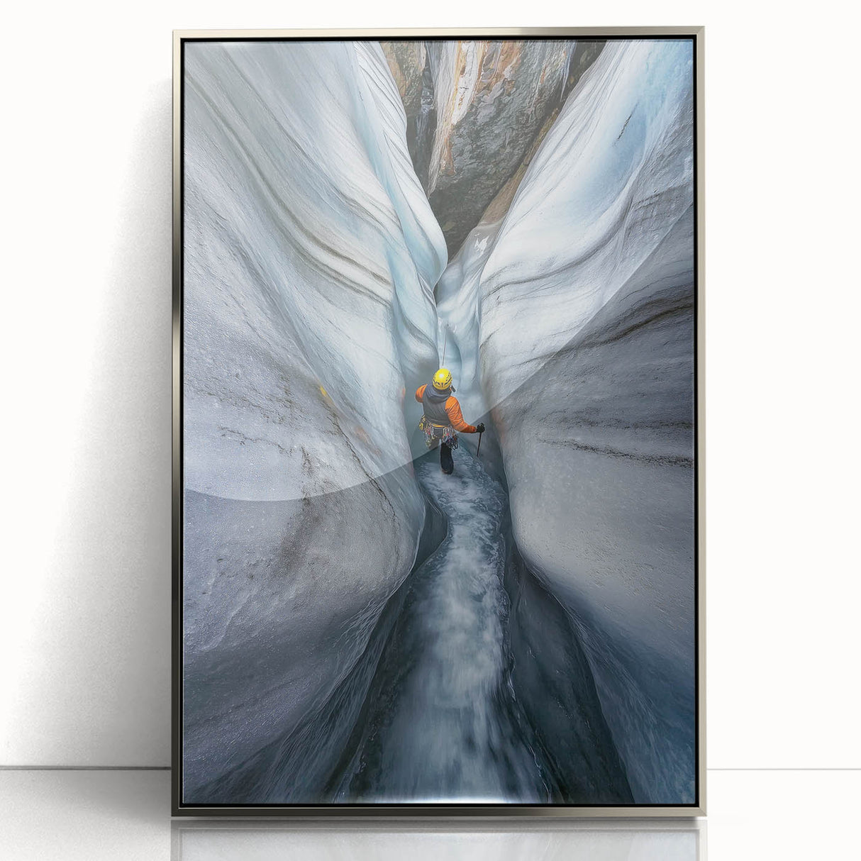 Framed acrylic art piece showcasing a stunning cave landscape with intricate details, highlighted by a sleek silver frame, ideal for modern home decor.
