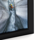 Close-up of a framed canvas depicting vibrant landscapes with intricate cave formations, showcasing earthy tones and textures, perfect for home decor enhancement.