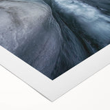 Vibrant rolled canvas artwork showcasing a stunning landscape with intricate cave formations and earthy tones, expertly wrapped for safe shipping in a durable tube.