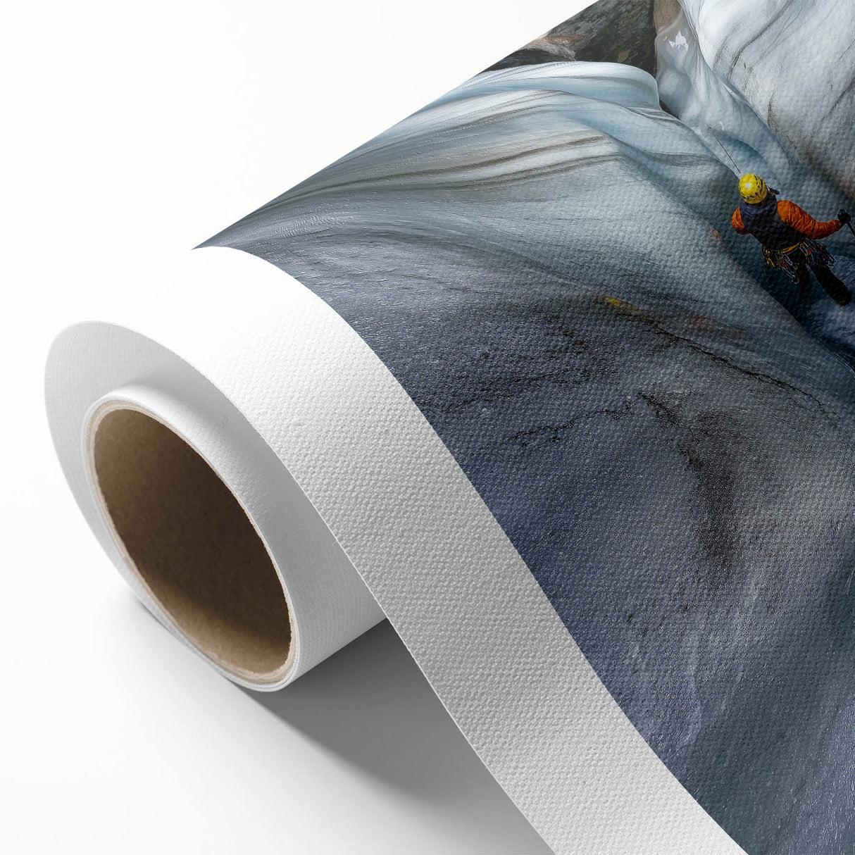 Rolled canvas artwork depicting a serene landscape with intricate cave formations and vibrant colors, securely packaged in a protective cardboard tube for safe delivery.