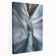 Stretched canvas artwork depicting a serene landscape with caves, showcasing rich earthy tones and intricate details, perfect for home decor enhancement.