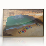 Framed acrylic artwork depicting stunning coastal cliffs at sunset, featuring vibrant gold accents and a modern aesthetic, perfect for home decor.