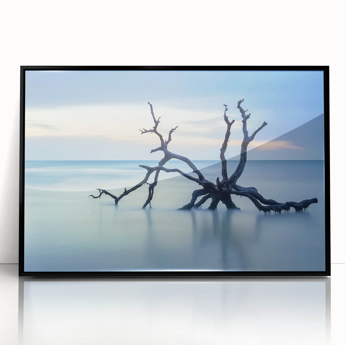 Framed acrylic art piece showcasing a stunning beach landscape with vibrant colors, ideal for coastal decor. The black frame enhances the serene seaside scene.