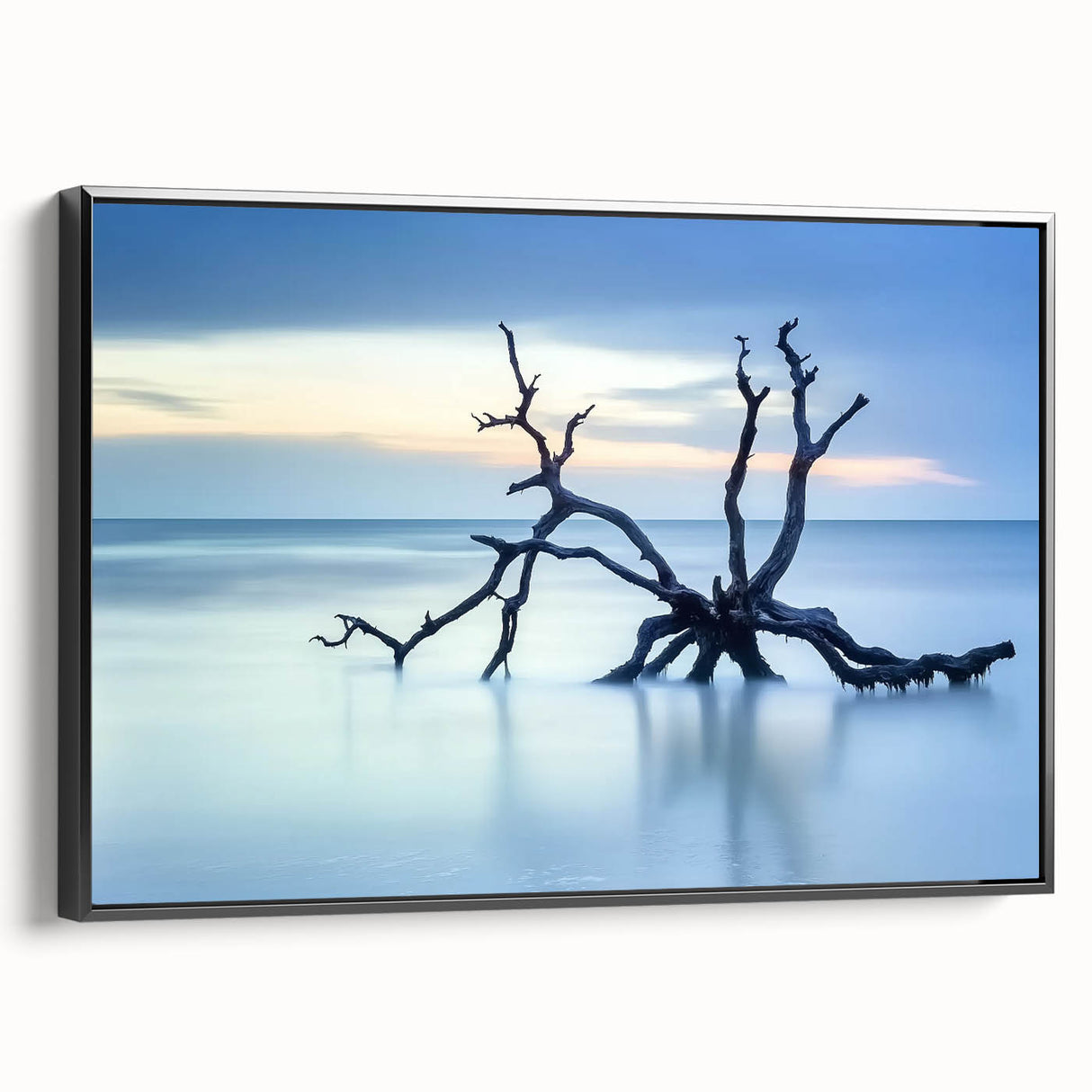 Framed canvas artwork depicting a serene beach landscape with vibrant colors and detailed textures, showcased in a sleek black frame, perfect for home decor.