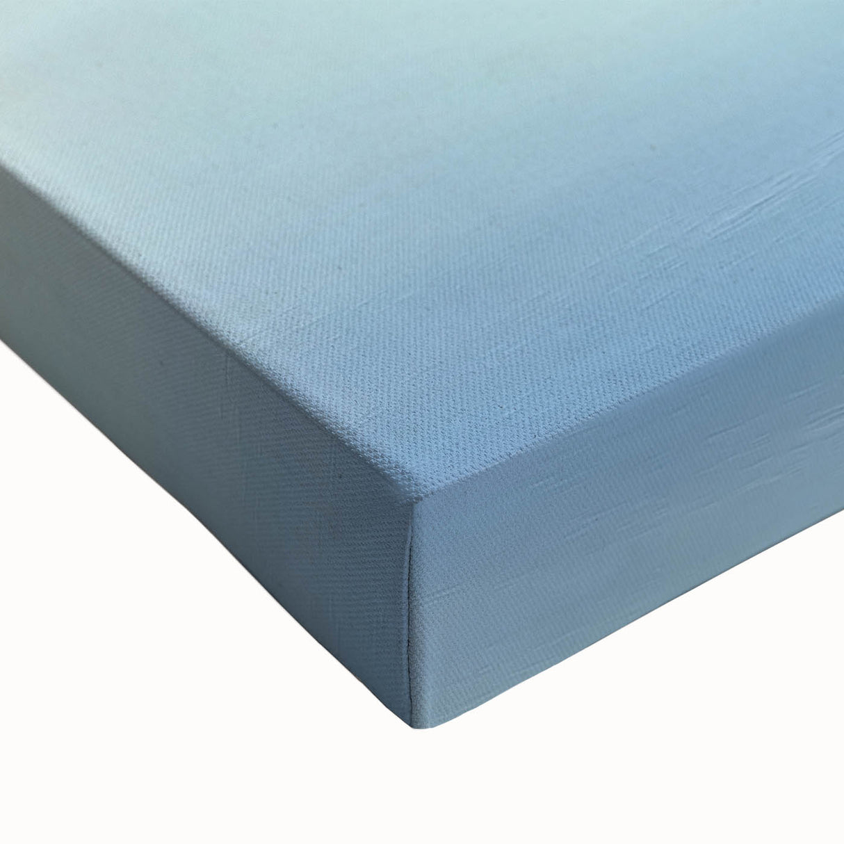 Close-up of a stretched canvas depicting a vibrant beach landscape, showcasing vivid blues of the ocean and soft golden sand, perfect for coastal decor.