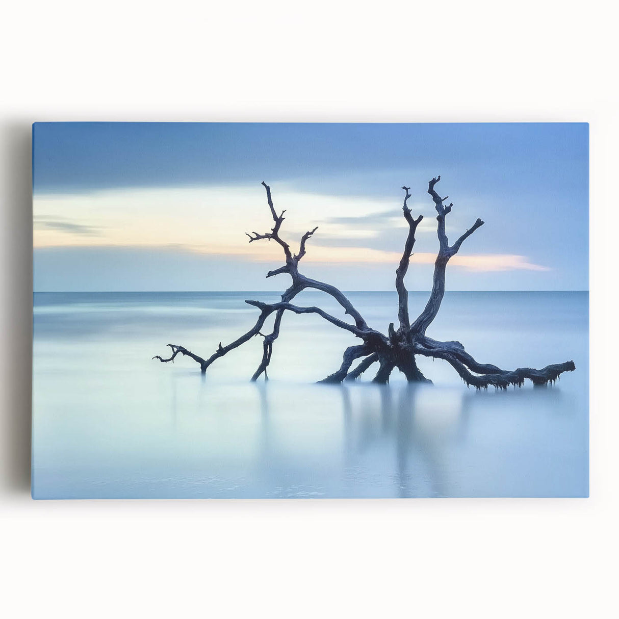 Vibrant stretched canvas artwork depicting a serene beach landscape at sunset, showcasing soft pastel colors and gentle waves, perfect for coastal home decor.