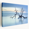 Stretched canvas artwork depicting a vibrant beach landscape with blue skies and golden sand, ideal for coastal-themed decor. Perfect for brightening living spaces.