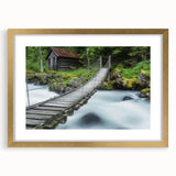 Elegant gold-framed landscape bridge artwork with a white mat, showcasing intricate details and a serene natural scene, perfect for home decor.