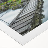 Landscape bridge design on rolled canvas showcasing vibrant colors and intricate details, ideal for home decor or art enthusiasts, packaged for easy display.