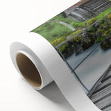 Rolled canvas artwork showcasing a vibrant landscape bridge design with intricate details and rich colors, ideal for home decor or art enthusiasts.