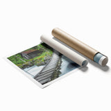 Landscape bridge rolled print showcasing intricate details of a serene waterway scene, featuring vibrant colors and textures, packaged securely for safe delivery.