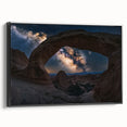 Framed landscape canvas art depicting a stunning view of canyons in rich earth tones, featuring a sleek black frame, perfect for modern home decor. Ideal for enhancing living spaces or office environments with natural beauty.