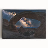 Stretched canvas artwork depicting a vibrant landscape of canyons at sunset, showcasing rich oranges and deep blues, perfect for enhancing home decor.