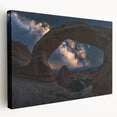 Stretched canvas artwork depicting a breathtaking landscape of canyons in warm earth tones, showcasing intricate details and textures, perfect for home decor.