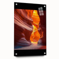 Acrylic glass artwork showcasing a vibrant desert landscape in rich colors, displayed at an angle with visible mounting pins, perfect for modern home decor.