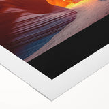 Desert landscape rolled canvas art showcasing vibrant hues of orange and red with intricate details, elegantly packaged in a protective cardboard tube for easy display.