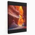 Desert landscape stretched canvas artwork showcasing warm hues of orange and yellow with a sun setting behind distant mountains, ideal for home decor.