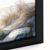 Close-up of black wall art featuring textured, colorful abstract design on a large framed canvas.