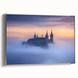 Framed canvas artwork depicting a picturesque landscape with a majestic castle, featuring a silver frame that enhances its elegance, perfect for home decor.