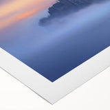 Rolled canvas artwork showcasing a picturesque landscape with a majestic castle surrounded by lush greenery and blue skies, ideal for home decor enthusiasts.