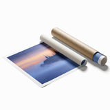 Rolled print showcasing a stunning landscape scene with a majestic castle, featuring vibrant colors and intricate details, packaged securely in a protective tube for easy transport.