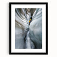 Framed landscape artwork showcasing a cave scene with intricate details, featuring a black mat, ideal for home decor and enhancing interior aesthetics.