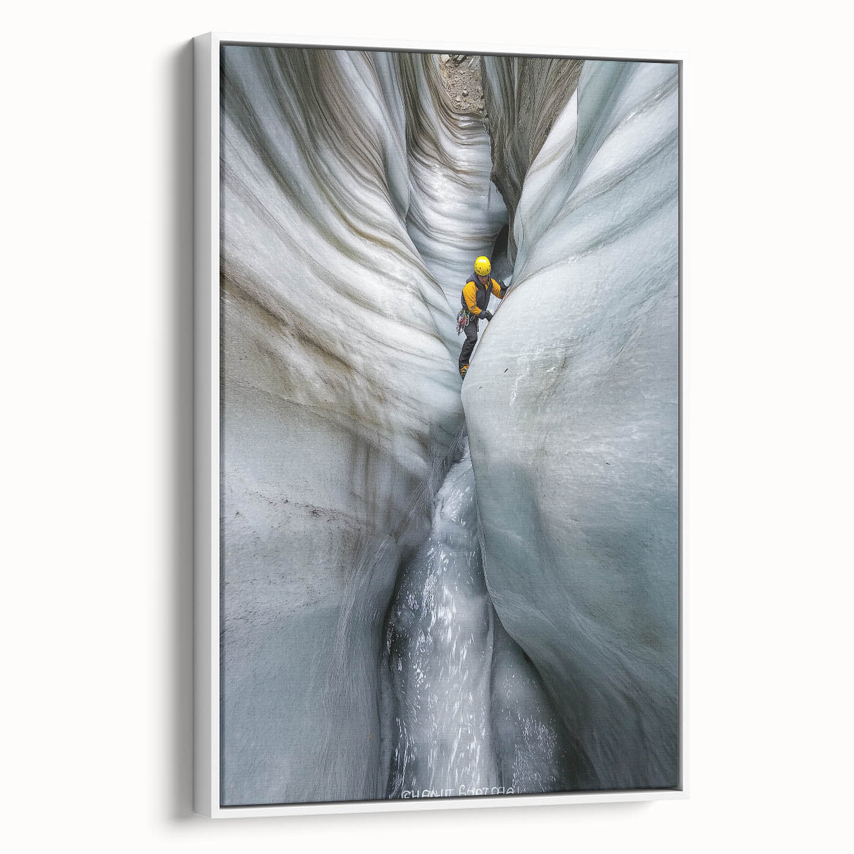 Framed canvas artwork showcasing a stunning landscape with intricate cave formations, set against a white background, perfect for modern home decor.